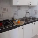 Baia Di Carlino Tourist Апартаменты *