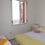 Baia Di Carlino Tourist Апартаменты *